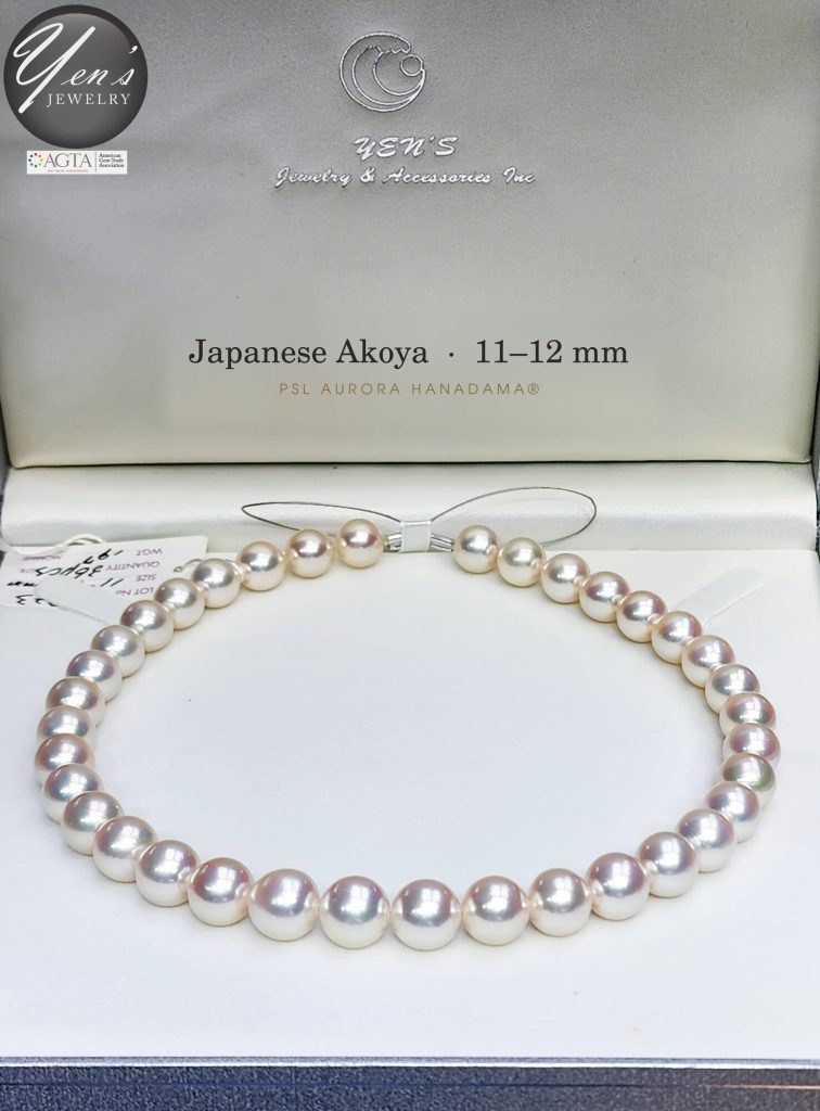 11 to 12 mm Aurora Hanadama Akoya pearl strand in a Yen’s presentation box