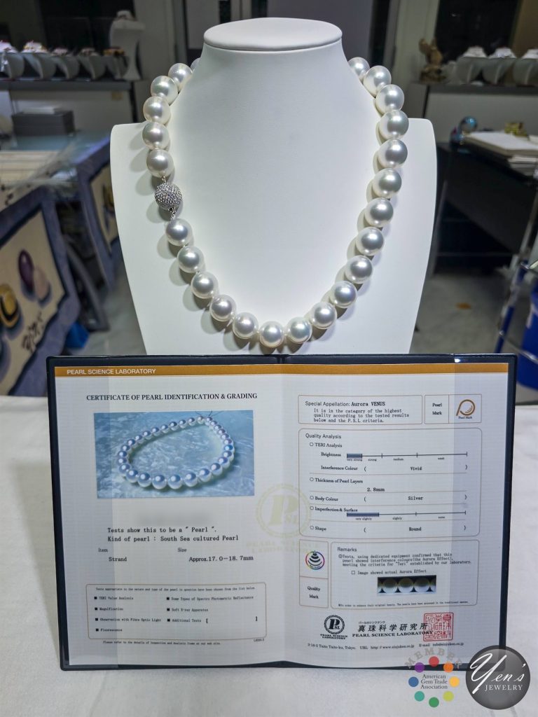 The South Sea strand on a white display bust with its PSL report in front, report number blurred