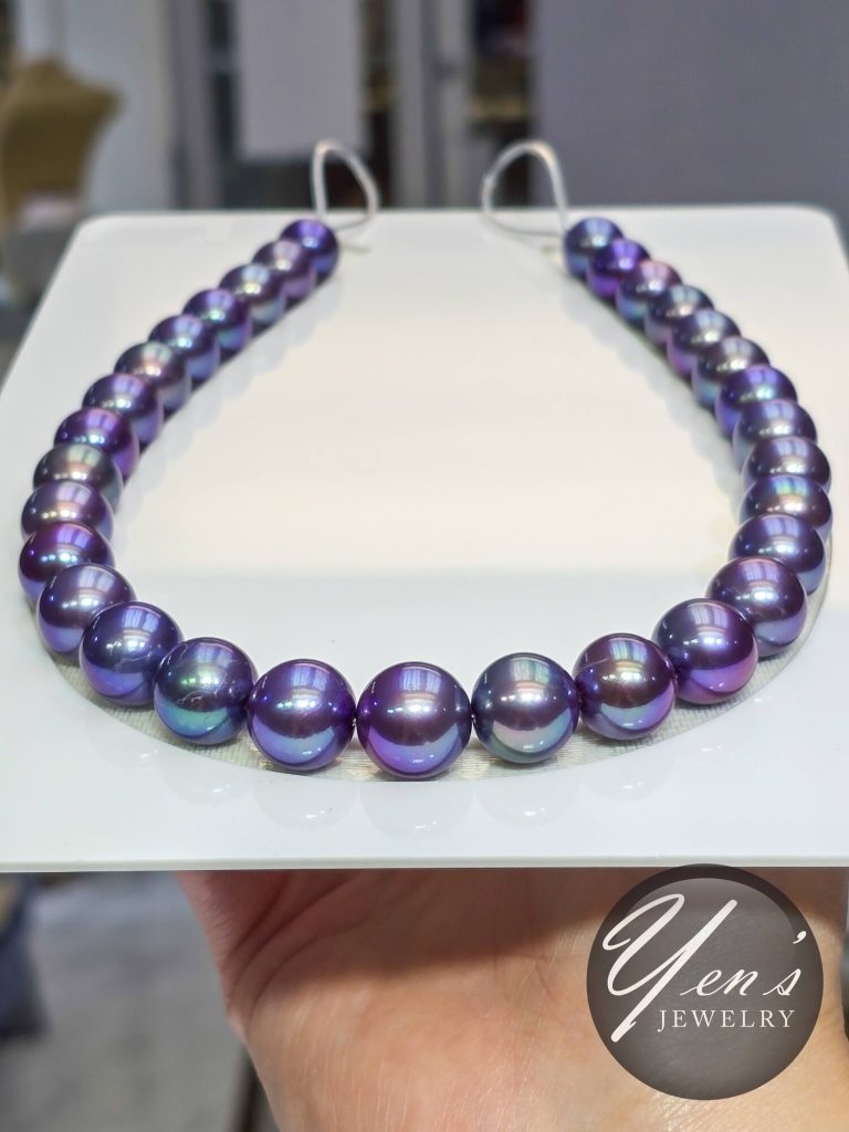 Tanzanite Blue Edison pearl strand, 13 to 15 mm, on a white tray
