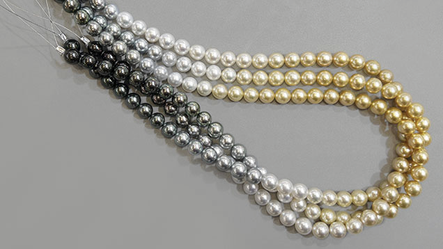 Ombré strands of Tahitian, white South Sea and golden South Sea cultured pearls